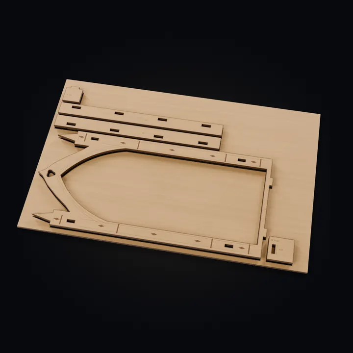 A cutting sheet of the medieval alley book nook in plywood, its parts pressed up out of the sheet