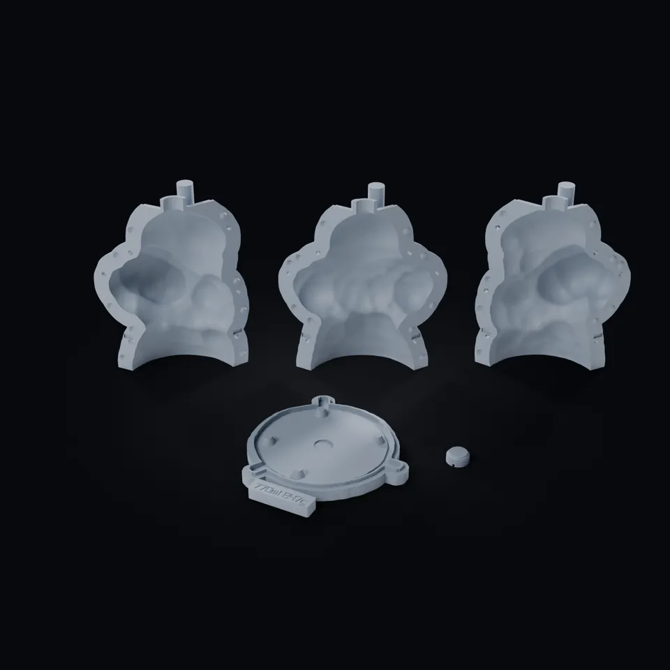 The five print files of the adaptive shell laid out as they print, labelled: the three printed wedges, the base plate and the port plug